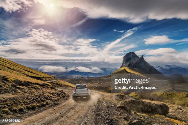 jeep on mountain road, mt. einhyrningur, central highlands, iceland - mountain roads stock pictures, royalty-free photos & images