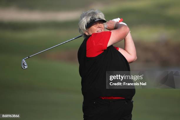 Laura Davies of England plays her second shot on the 14th hole during Day One of the Fatima Bint Mubarak Ladies Open at Saadiyat Beach Golf Club on...