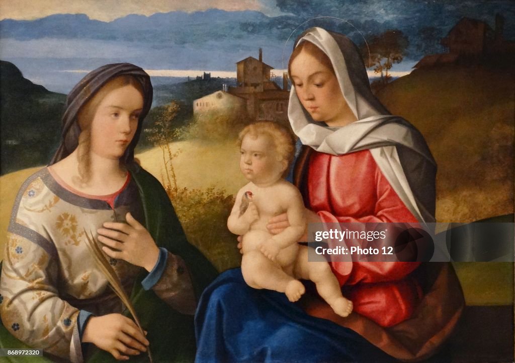 The Virgin and Child with Saint Agnes in a Landscape.