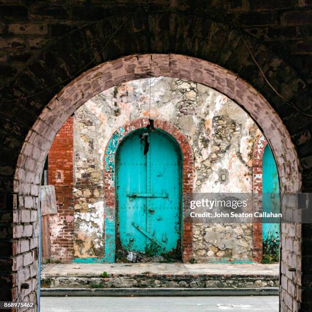 warehouse doors in jacmel - haïti photos et images de collection