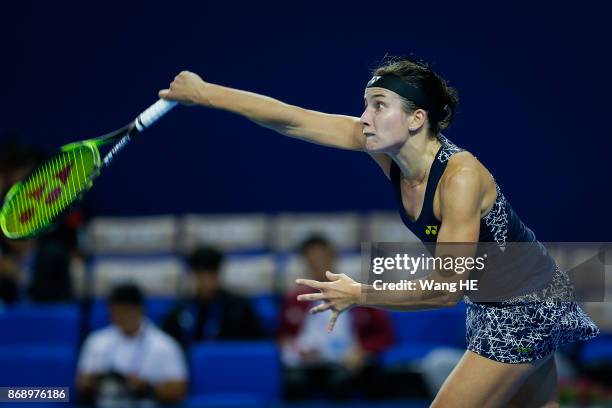 Anastasija Sevastova of Latvia serves in her match against Sloane Stephens of the USA during the WTA Elite Trophy Zhuhai 2017 at Hengqin Tennis...