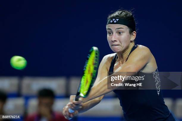 Anastasija Sevastova of Latvia hits a return in her match against Sloane Stephens of the USA during the WTA Elite Trophy Zhuhai 2017 at Hengqin...