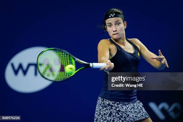 Anastasija Sevastova of Latvia hits a return in her match against Sloane Stephens of the USA during the WTA Elite Trophy Zhuhai 2017 at Hengqin...