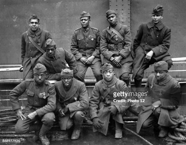 Soldiers of the 369th regiment of the American Army who won the Croix de Guerre for gallantry in action. Left to right. Front row: Ed Williams,...