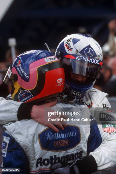 Jacques Villeneuve, David Coulthard, Williams-Renault FW19, Grand Prix of Europe, Circuito de Jerez, 26 October 1997. Jacques Villeneuve being hugged...