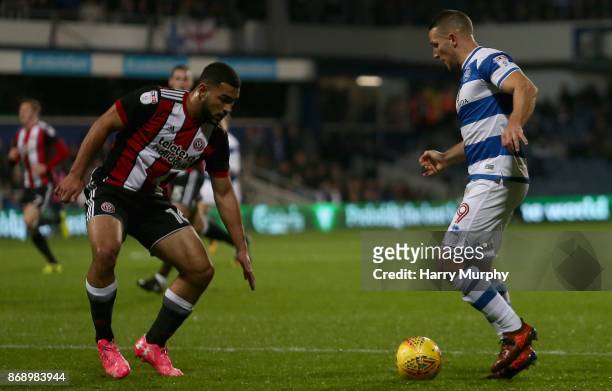 Conor Washington of Queens Park Rangers takes on Cameron Carter-Vickers of Sheffield United during the Sky Bet Championship match between Queens Park...