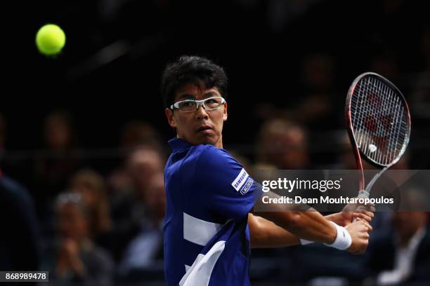 Chung Hyeon of South Korea returns a backhand against Rafael Nadal of Spain during Day 3 of the Rolex Paris Masters held at the AccorHotels Arena on...