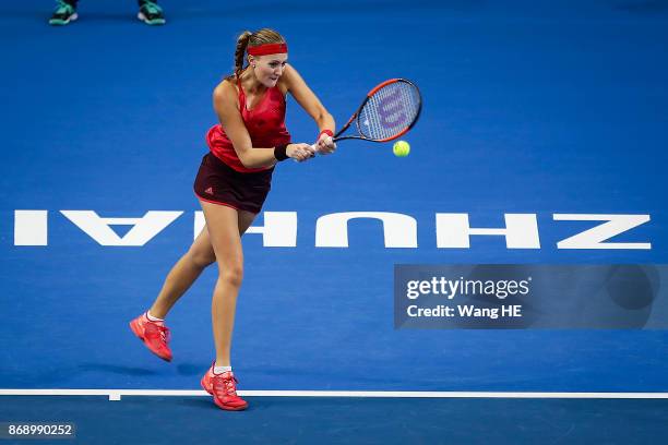 Kristina Mladenovic of France hits a return in her match against Magdalena Rybarikova of Slovakia during the WTA Elite Trophy Zhuhai 2017 at Hengqin...