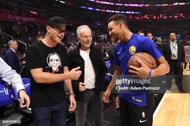 Actor, Tobin Bell talks with Stephen Curry of the Golden State Warriors before the game against the LA Clippers on October 30, 2017 at STAPLES Center...