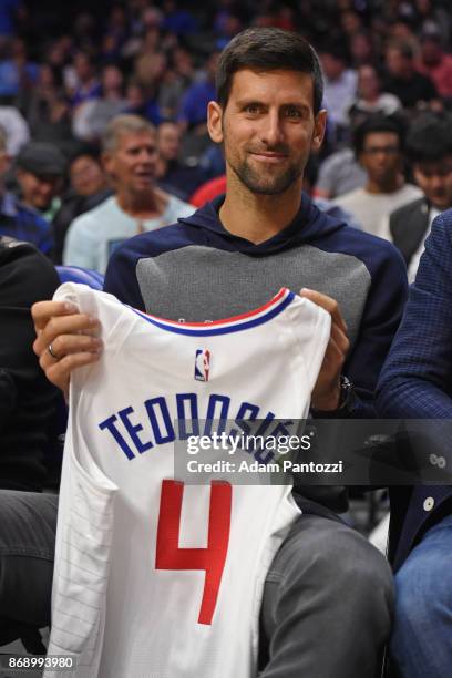 Tennis player, Novak Djokovic attends the Golden State Warriors game against the LA Clippers on October 30, 2017 at STAPLES Center in Los Angeles,...