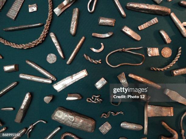 The Cuerdale Hoard; part of a Viking silver hoard found in a lead chest beside the River Ribble at Cuerdale, Lancashire. Consisting of around 7500...