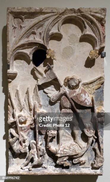 Tableau relief of St. Michael by Mestre San Mateo. Dated 14th Century.