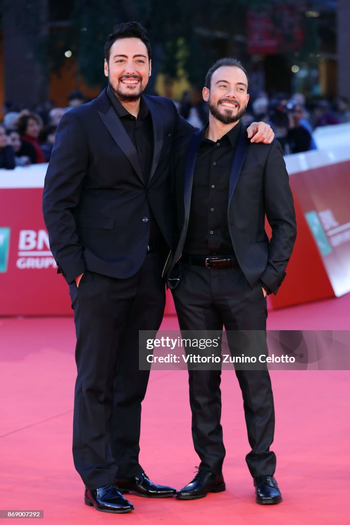 Ciro Capriello and Simone Ruzzo walk a red carpet for 'Addio Fottuti