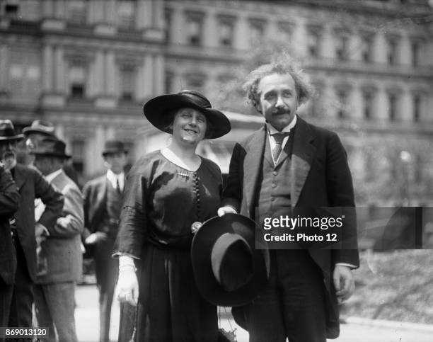 Albert Einstein with his wife Elsa, State, War, and Navy building in background, Washington DC. Photographer Harris and Ewing. 1921 and 1923.