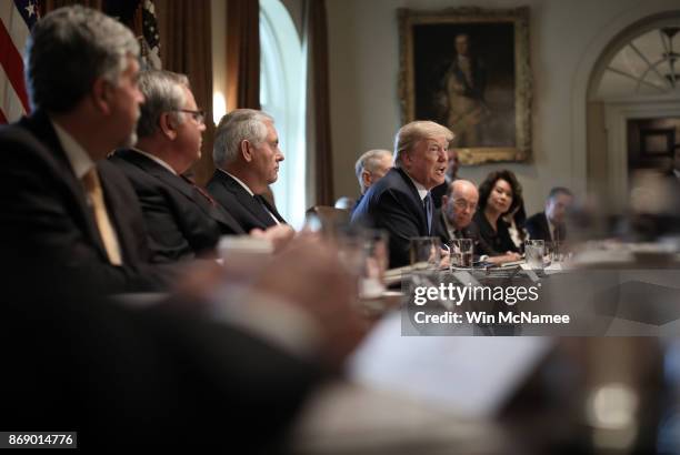 President Donald Trump speaks while meeting with members of his cabinet November 1, 2017 in Washington, DC. During his remarks, Trump commented on...