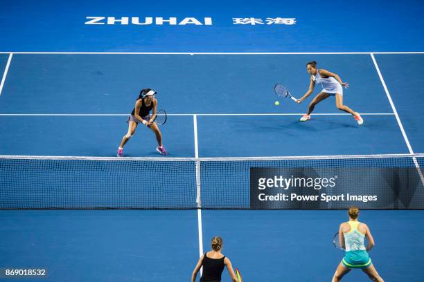 Jing-Jing Lu and Shuai Zhang of China in action during the doubles Round Robin match of the WTA Elite Trophy Zhuhai 2017 against Alicja Rosolska of...
