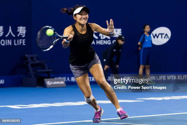 Jing-Jing Lu and Shuai Zhang of China in action during the doubles Round Robin match of the WTA Elite Trophy Zhuhai 2017 against Alicja Rosolska of...