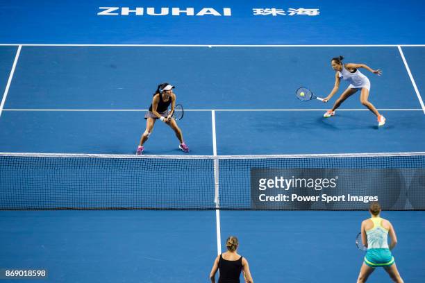 Jing-Jing Lu and Shuai Zhang of China in action during the doubles Round Robin match of the WTA Elite Trophy Zhuhai 2017 against Alicja Rosolska of...
