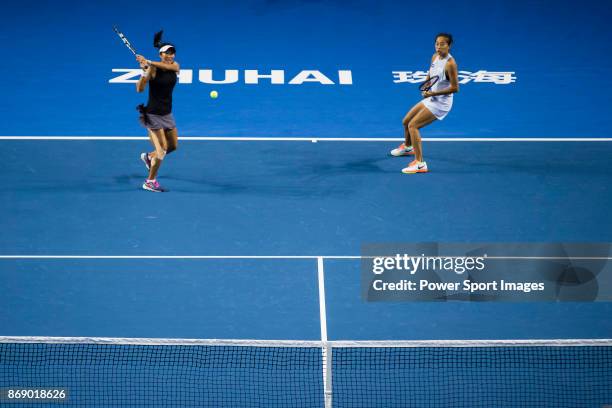 Jing-Jing Lu and Shuai Zhang of China in action during the doubles Round Robin match of the WTA Elite Trophy Zhuhai 2017 against Alicja Rosolska of...