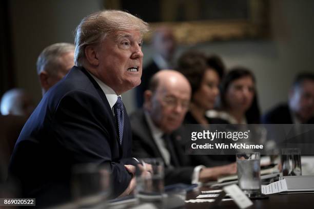 President Donald Trump speaks while meeting with members of his cabinet November 1, 2017 in Washington, DC. During his remarks, Trump commented on...