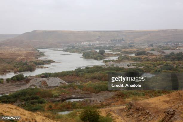 Tigris river, passing through a triangle merging the borders of Iraq, Syria and Turkey, is seen near unofficial border gate named Fishkhabour between...