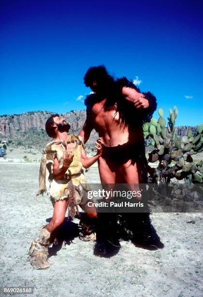 Ex Beatle, Ringo Starr and John Matuszak on the set of the movie "Caveman", the movie where he met co star Barbara Bach and later married her. John...