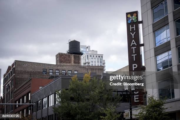 Signage is displayed outside the Hyatt Place hotel in Chicago, Illinois, U.S., on Monday, Oct. 30, 2017. Hyatt Hotels Corp. Is scheduled to release...