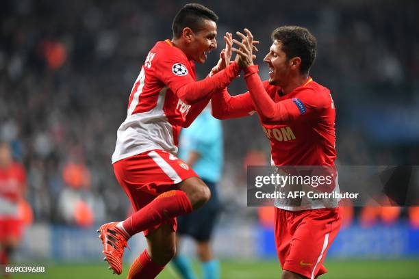 Monaco's Portuguese midfielder Rony Lopes celebrates with Monaco's Montenegrin forward Stevan Jovetic after scoring a goal during the UEFA Champions...