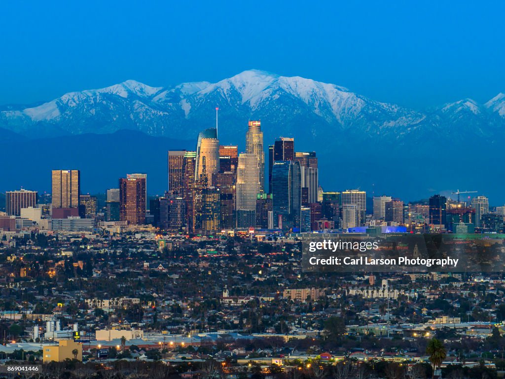 Los Angeles Skyline With Snow Capped Mountains