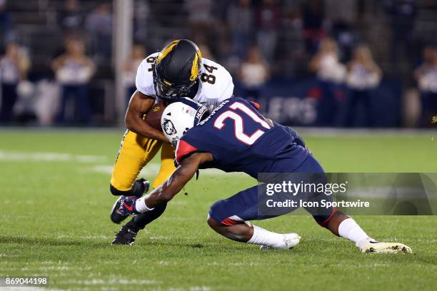 Missouri Tigers wide receiver Emanuel Hall and UConn Huskies defensive back Jamar Summers in action during a college football game between Missouri...