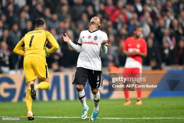 Besiktas' Portuguese midfielder Ricardo Quaresma reacts after missing a goal opportunity during the UEFA Champions League Group G football match...