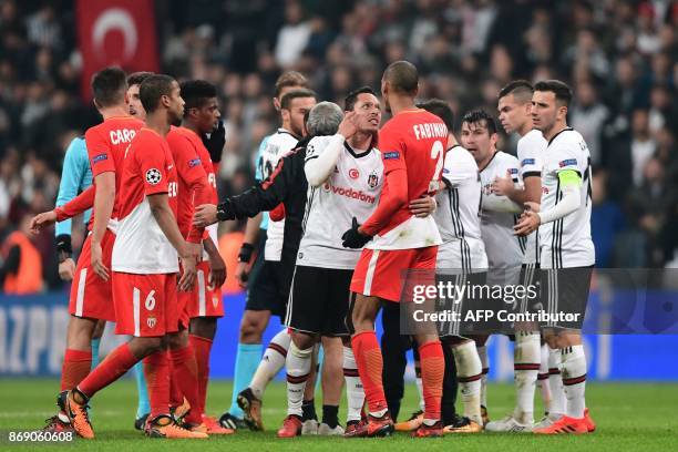 Players react at the end of the UEFA Champions League Group G football match between Besiktas and Monaco on November 1 at the Vodafone Park in...