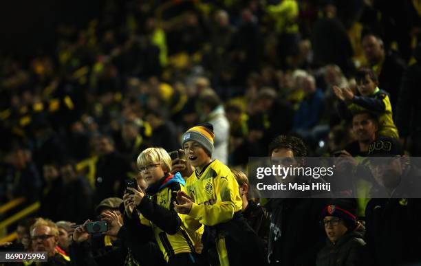 Borussia Dortmund fans enjoy the pre match atmosphere prior to the UEFA Champions League group H match between Borussia Dortmund and APOEL Nikosia at...