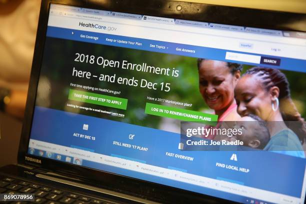 Computer screen shows the enrollment page for the Affordable Care Act on November 1, 2017 in Miami, Florida. The open enrollment period to sign up...