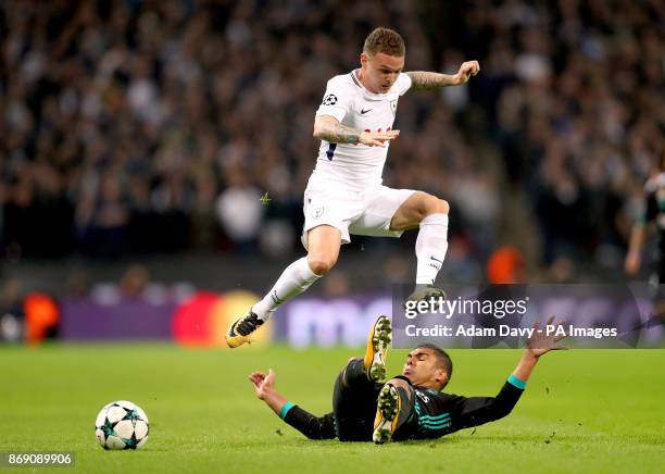 Real Madrid's Casemiro slides in on Tottenham Hotspur's Kieran Trippier during the UEFA Champions League, Group H match at Wembley Stadium, London.