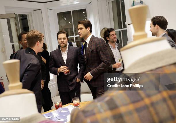 Alex Potter and Luke Pasqualino attend an intimate evening hosted by Paul Smith & The Gentleman's Journal to introduce the Paul Smith Bespoke By...