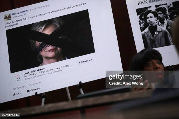 Print out of a social media post targeting former Democratic presidential candidate Hillary Clinton is on display as Rep. Terri Sewell speaks during...