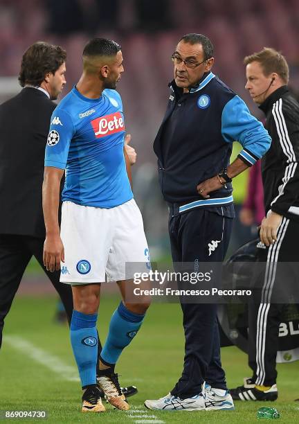 Coach of SSC Napoli Maurizio Sarri and injured player Faouzi Ghoulam during the UEFA Champions League group F match between SSC Napoli and Manchester...