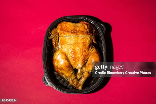 an organic rotisserie chicken - rotisserie stock pictures, royalty-free photos & images