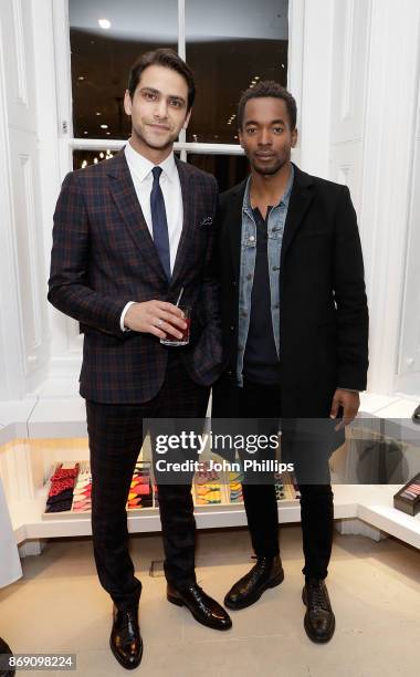 Luke Pasqualino and Aki Omoshaybi attend an intimate evening hosted by Paul Smith & The Gentleman's Journal to introduce the Paul Smith Bespoke By...