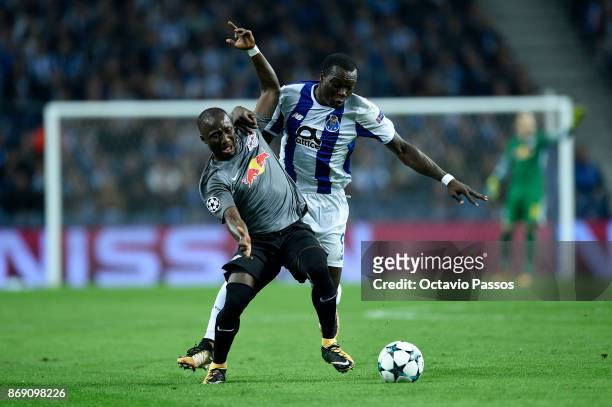 Vincent Aboubakar of FC Porto competes for the ball with Naby Keita of RB Leipzig during the UEFA Champions League group G match between FC Porto and...