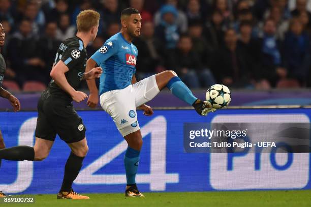 Faouzi Ghoulam of Napoli controls the ball as Kevin De Bruyne of Manchester City tackles during the UEFA Champions League group F match between SSC...