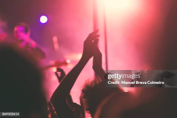 concert - head banging stock pictures, royalty-free photos & images