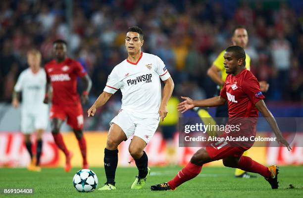 Wissam Ben Yedder of Sevilla FC being followed by Fernando Lucas Martins of FC Spartak Moskva during the UEFA Champions League group E match between...