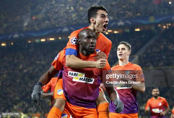 Mickael Pote of Apoel FC celebrates scoring his sides first goal with his team mates during the UEFA Champions League group H match between Borussia...