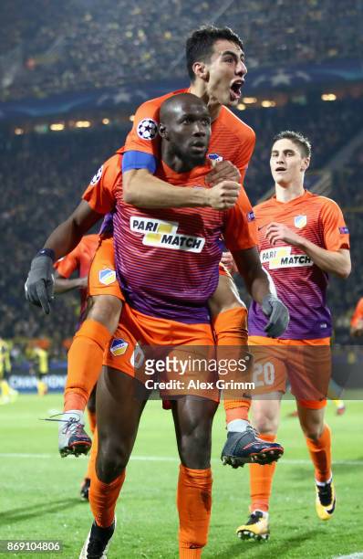 Mickael Pote of Apoel FC celebrates scoring his sides first goal with his team mates during the UEFA Champions League group H match between Borussia...