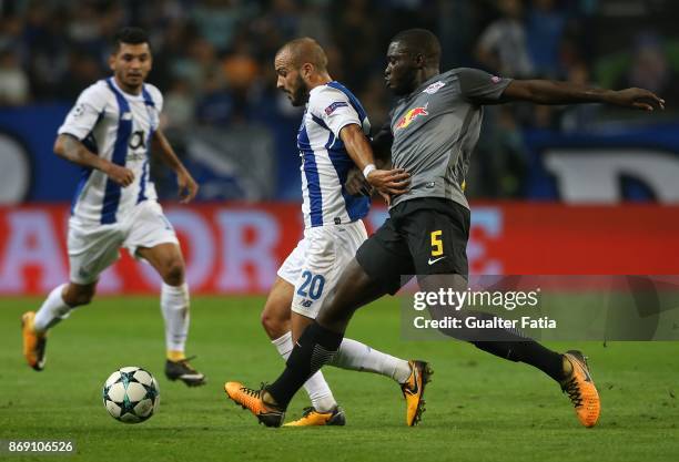 Porto midfielder Andre Andre from Portugal with RB Leipzig defender Dayot Upamecano from France in action during the UEFA Champions League match...