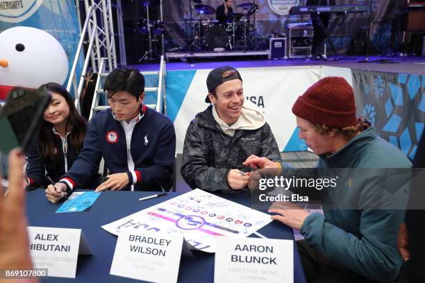 Skiers Bradley Wilson and Aaron Blunck sign autographs during the 100 Days Out 2018 PyeongChang Winter Olympics Celebration - Team USA in Times...