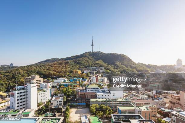 aerial view towards n seoul tower and seoul city - namsan stock pictures, royalty-free photos & images