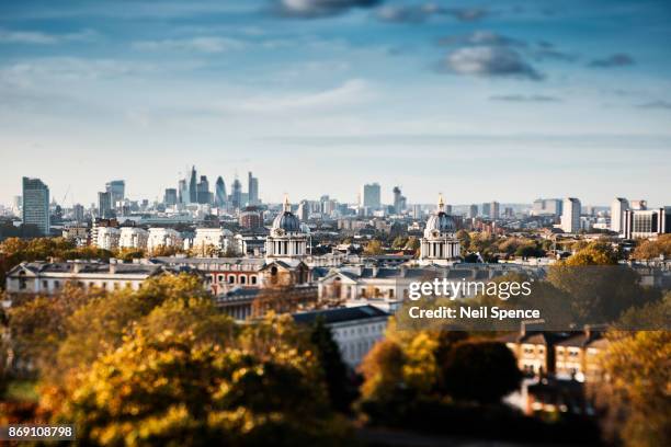 london skyline and the city from greenwich park with the royal naval college - greenwich stock-fotos und bilder